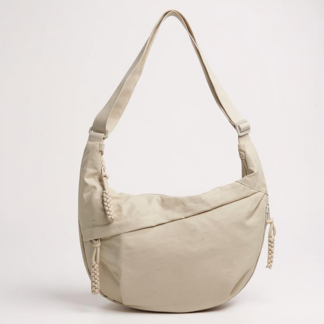 Gayle half-moon sling bag in beige