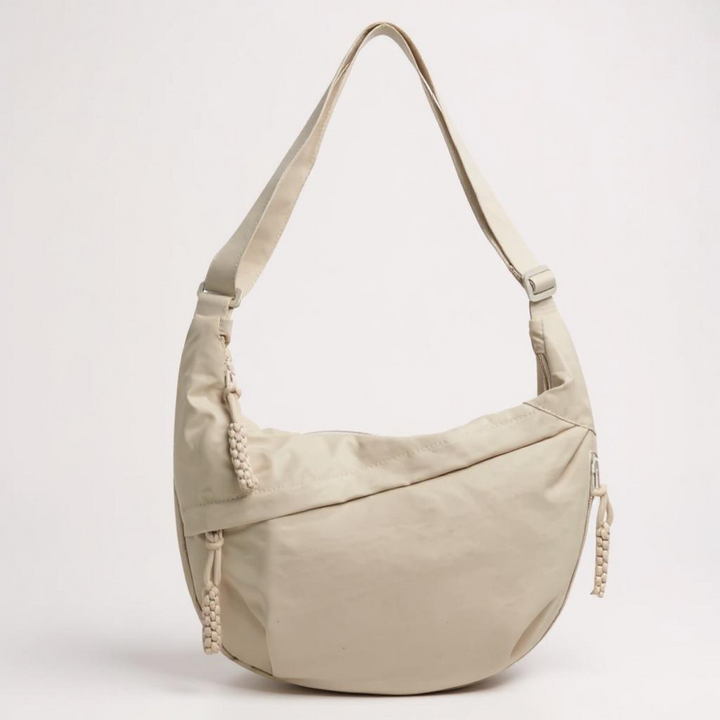 Gayle half-moon sling bag in beige
