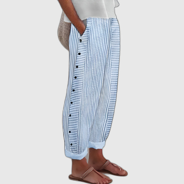 Glenys side-button striped pants in blue on a plain grey background
